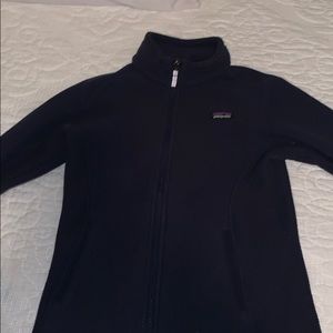 A never worn, navy blue patagonia jacket!